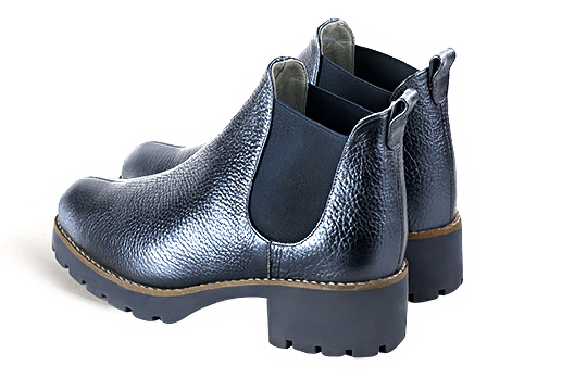 Denim blue women's ankle boots, with elastics. Round toe. Low rubber soles. Rear view - Florence KOOIJMAN